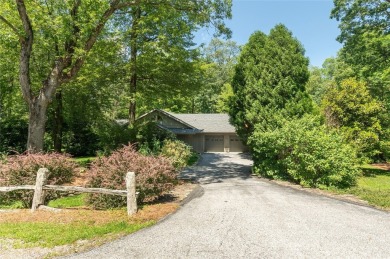 Located just outside the gates of Wildcat Cliffs Country Club on Wildcat Cliffs Country Club in North Carolina - for sale on GolfHomes.com, golf home, golf lot