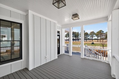 Step into relaxed coastal elegance with the Magnolia, a on Bay Creek Golf Club in Virginia - for sale on GolfHomes.com, golf home, golf lot