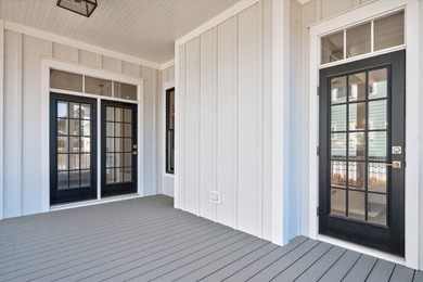 Step into relaxed coastal elegance with the Magnolia, a on Bay Creek Golf Club in Virginia - for sale on GolfHomes.com, golf home, golf lot