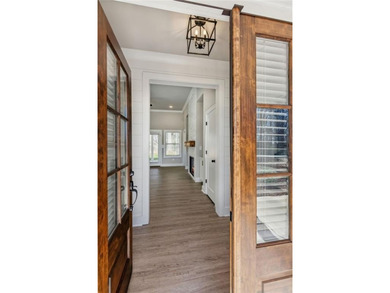 Nestled in the prestigious gated community of The Orchard in on The Orchard Golf and Country Club in Georgia - for sale on GolfHomes.com, golf home, golf lot