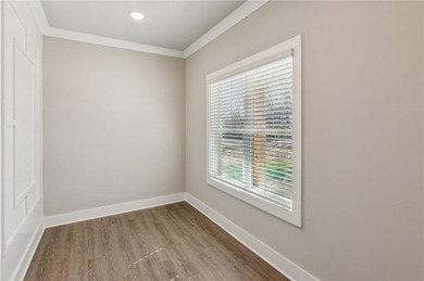 Nestled in the prestigious gated community of The Orchard in on The Orchard Golf and Country Club in Georgia - for sale on GolfHomes.com, golf home, golf lot