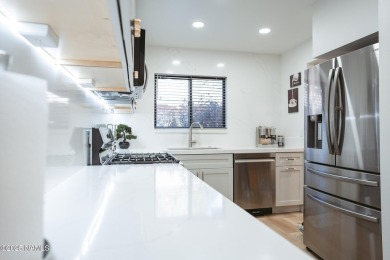 This absolutely stunning townhome located on the 17th fairway of on Aspen Valley Golf Club in Arizona - for sale on GolfHomes.com, golf home, golf lot