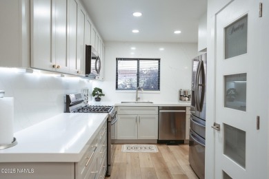 This absolutely stunning townhome located on the 17th fairway of on Aspen Valley Golf Club in Arizona - for sale on GolfHomes.com, golf home, golf lot
