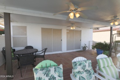 Adorable patio home on Casa Grande Lakes. High ceilings. Bright on Dave White Reg Park and Golf Course in Arizona - for sale on GolfHomes.com, golf home, golf lot