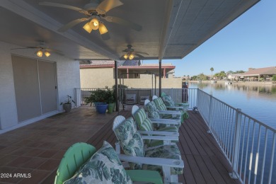 Adorable patio home on Casa Grande Lakes. High ceilings. Bright on Dave White Reg Park and Golf Course in Arizona - for sale on GolfHomes.com, golf home, golf lot