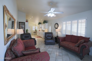 Adorable patio home on Casa Grande Lakes. High ceilings. Bright on Dave White Reg Park and Golf Course in Arizona - for sale on GolfHomes.com, golf home, golf lot