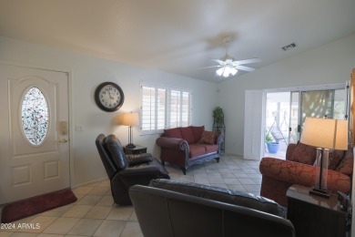 Adorable patio home on Casa Grande Lakes. High ceilings. Bright on Dave White Reg Park and Golf Course in Arizona - for sale on GolfHomes.com, golf home, golf lot