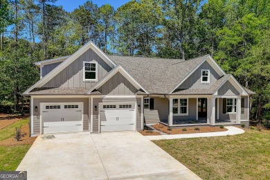 NEW CONSTRUCTION HOME IN THE VILLAGE OF OSPREY POINTE on Harbor Club Golf and Country Club in Georgia - for sale on GolfHomes.com, golf home, golf lot