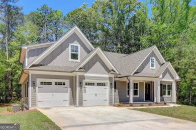 NEW CONSTRUCTION HOME IN THE VILLAGE OF OSPREY POINTE on Harbor Club Golf and Country Club in Georgia - for sale on GolfHomes.com, golf home, golf lot