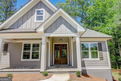 NEW CONSTRUCTION HOME IN THE VILLAGE OF OSPREY POINTE on Harbor Club Golf and Country Club in Georgia - for sale on GolfHomes.com, golf home, golf lot