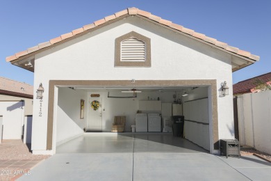 Adorable patio home on Casa Grande Lakes. High ceilings. Bright on Dave White Reg Park and Golf Course in Arizona - for sale on GolfHomes.com, golf home, golf lot