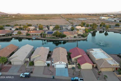 Adorable patio home on Casa Grande Lakes. High ceilings. Bright on Dave White Reg Park and Golf Course in Arizona - for sale on GolfHomes.com, golf home, golf lot