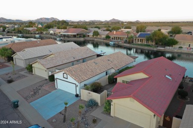 Adorable patio home on Casa Grande Lakes. High ceilings. Bright on Dave White Reg Park and Golf Course in Arizona - for sale on GolfHomes.com, golf home, golf lot