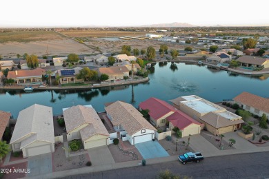 Adorable patio home on Casa Grande Lakes. High ceilings. Bright on Dave White Reg Park and Golf Course in Arizona - for sale on GolfHomes.com, golf home, golf lot