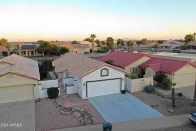 Adorable patio home on Casa Grande Lakes. High ceilings. Bright on Dave White Reg Park and Golf Course in Arizona - for sale on GolfHomes.com, golf home, golf lot