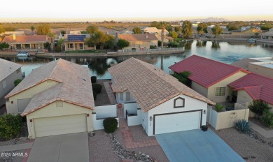 Adorable patio home on Casa Grande Lakes. High ceilings. Bright on Dave White Reg Park and Golf Course in Arizona - for sale on GolfHomes.com, golf home, golf lot