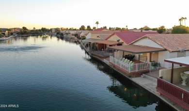 Adorable patio home on Casa Grande Lakes. High ceilings. Bright on Dave White Reg Park and Golf Course in Arizona - for sale on GolfHomes.com, golf home, golf lot