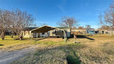 Welcome to Lake Fork Living! This charming 3-bedroom, 2-bathroom on Links At Lands End in Texas - for sale on GolfHomes.com, golf home, golf lot