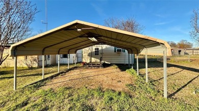 Welcome to Lake Fork Living! This charming 3-bedroom, 2-bathroom on Links At Lands End in Texas - for sale on GolfHomes.com, golf home, golf lot