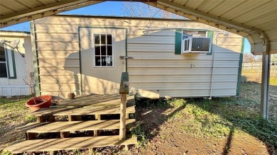 Welcome to Lake Fork Living! This charming 3-bedroom, 2-bathroom on Links At Lands End in Texas - for sale on GolfHomes.com, golf home, golf lot