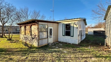 Welcome to Lake Fork Living! This charming 3-bedroom, 2-bathroom on Links At Lands End in Texas - for sale on GolfHomes.com, golf home, golf lot