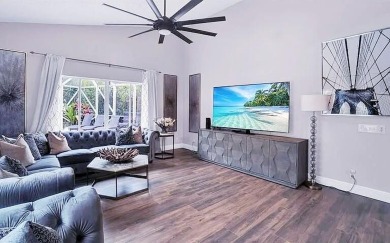 Just 4 min to WEF, this exceptionally secluded Tennis Court on The Wanderers Club in Florida - for sale on GolfHomes.com, golf home, golf lot