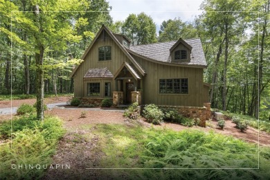 Welcome to this charming custom cottage, nestled among lush on Natures Walk At Chinquapin in North Carolina - for sale on GolfHomes.com, golf home, golf lot