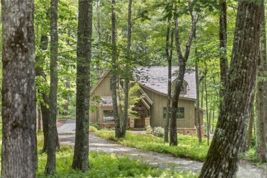 Welcome to this charming custom cottage, nestled among lush on Natures Walk At Chinquapin in North Carolina - for sale on GolfHomes.com, golf home, golf lot