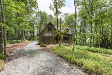 Welcome to this charming custom cottage, nestled among lush on Natures Walk At Chinquapin in North Carolina - for sale on GolfHomes.com, golf home, golf lot