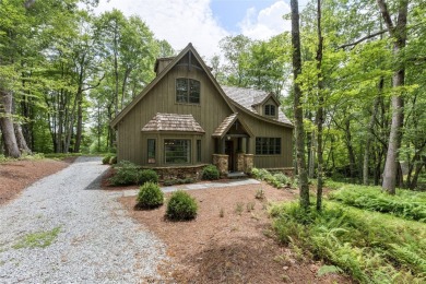 Welcome to this charming custom cottage, nestled among lush on Natures Walk At Chinquapin in North Carolina - for sale on GolfHomes.com, golf home, golf lot