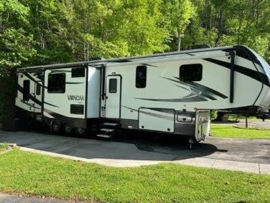 Lot is located across the road from the lake and backs up to the on Bent Creek Golf Course in Tennessee - for sale on GolfHomes.com, golf home, golf lot