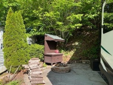 Lot is located across the road from the lake and backs up to the on Bent Creek Golf Course in Tennessee - for sale on GolfHomes.com, golf home, golf lot