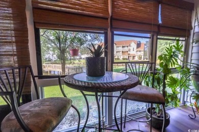 Don't miss out on this 1st floor open concept unit that has a on Island Green Golf Club in South Carolina - for sale on GolfHomes.com, golf home, golf lot