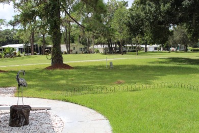 This is a beautifully maintained and upgraded property! Its on Schalamar Creek Golf and Country Club in Florida - for sale on GolfHomes.com, golf home, golf lot