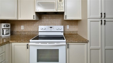 Second floor condo with beautiful golf and water views!! BEST on Kelly Greens Golf and Country Club in Florida - for sale on GolfHomes.com, golf home, golf lot