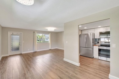 NEW! GROUND LEVEL WALK-IN CORNER CONDOPLETELY RENOVATED LARGEST on Kings Point Golf -Flanders Way in Florida - for sale on GolfHomes.com, golf home, golf lot