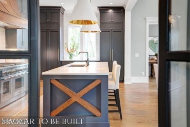 Discover luxury coastal living at 1878 Goose Creek Road on Brick Landing Plantation Yacht and Golf Club in North Carolina - for sale on GolfHomes.com, golf home, golf lot