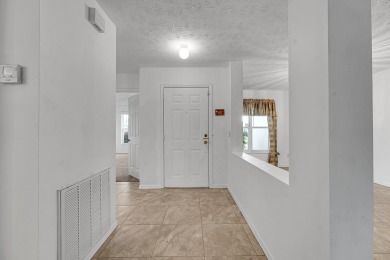 Beautiful 2-bedroom, 2-bath CBS block home in the desirable 55+ on Spanish Lakes Fairways in Florida - for sale on GolfHomes.com, golf home, golf lot