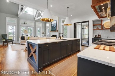 Wake up each morning to sweeping Intracoastal Waterway views on Brick Landing Plantation Yacht and Golf Club in North Carolina - for sale on GolfHomes.com, golf home, golf lot