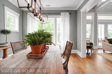 Discover luxury coastal living at 1878 Goose Creek Road on Brick Landing Plantation Yacht and Golf Club in North Carolina - for sale on GolfHomes.com, golf home, golf lot