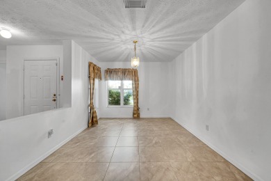 Beautiful 2-bedroom, 2-bath CBS block home in the desirable 55+ on Spanish Lakes Fairways in Florida - for sale on GolfHomes.com, golf home, golf lot