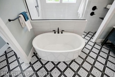 Discover luxury coastal living at 1878 Goose Creek Road on Brick Landing Plantation Yacht and Golf Club in North Carolina - for sale on GolfHomes.com, golf home, golf lot