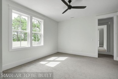 Discover luxury coastal living at 1878 Goose Creek Road on Brick Landing Plantation Yacht and Golf Club in North Carolina - for sale on GolfHomes.com, golf home, golf lot