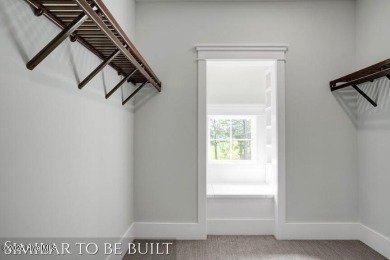 Discover luxury coastal living at 1878 Goose Creek Road on Brick Landing Plantation Yacht and Golf Club in North Carolina - for sale on GolfHomes.com, golf home, golf lot