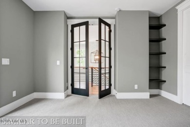 Discover luxury coastal living at 1878 Goose Creek Road on Brick Landing Plantation Yacht and Golf Club in North Carolina - for sale on GolfHomes.com, golf home, golf lot