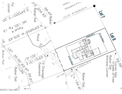 Discover luxury coastal living at 1878 Goose Creek Road on Brick Landing Plantation Yacht and Golf Club in North Carolina - for sale on GolfHomes.com, golf home, golf lot