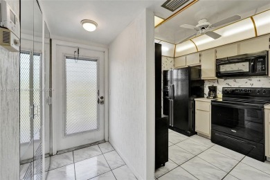 Washer/dryer in unit.Spacious/furnished 2 bed/2 bath condo on Sunrise Lakes Phase IV Golf Course in Florida - for sale on GolfHomes.com, golf home, golf lot