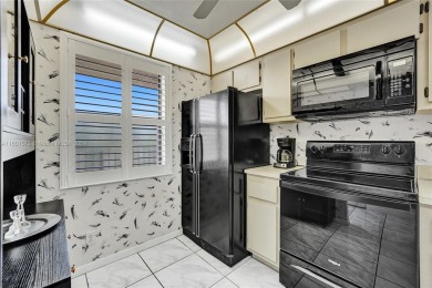 Washer/dryer in unit.Spacious/furnished 2 bed/2 bath condo on Sunrise Lakes Phase IV Golf Course in Florida - for sale on GolfHomes.com, golf home, golf lot