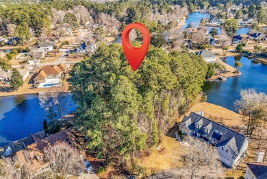 Beautiful .83 acre lot with lake view in *The Lakes* Community on Indigo Creek Golf Club in South Carolina - for sale on GolfHomes.com, golf home, golf lot