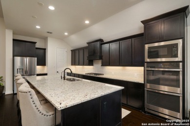 Step into luxury living at 24321 Downhill Lie, a stunning on TPC of San Antonio in Texas - for sale on GolfHomes.com, golf home, golf lot
